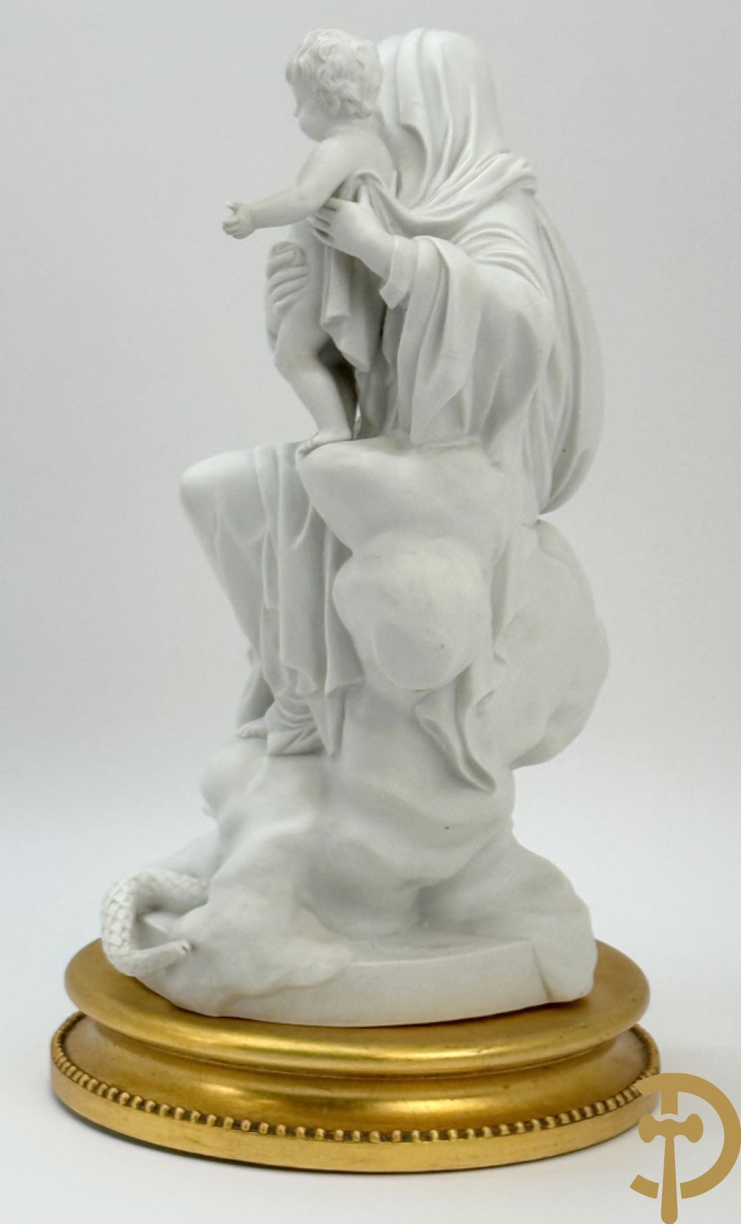Boizet getekend, witte biscuit van Madonna met kind steunende op slang, gemerkt Sèvres, op vergulde sokkel