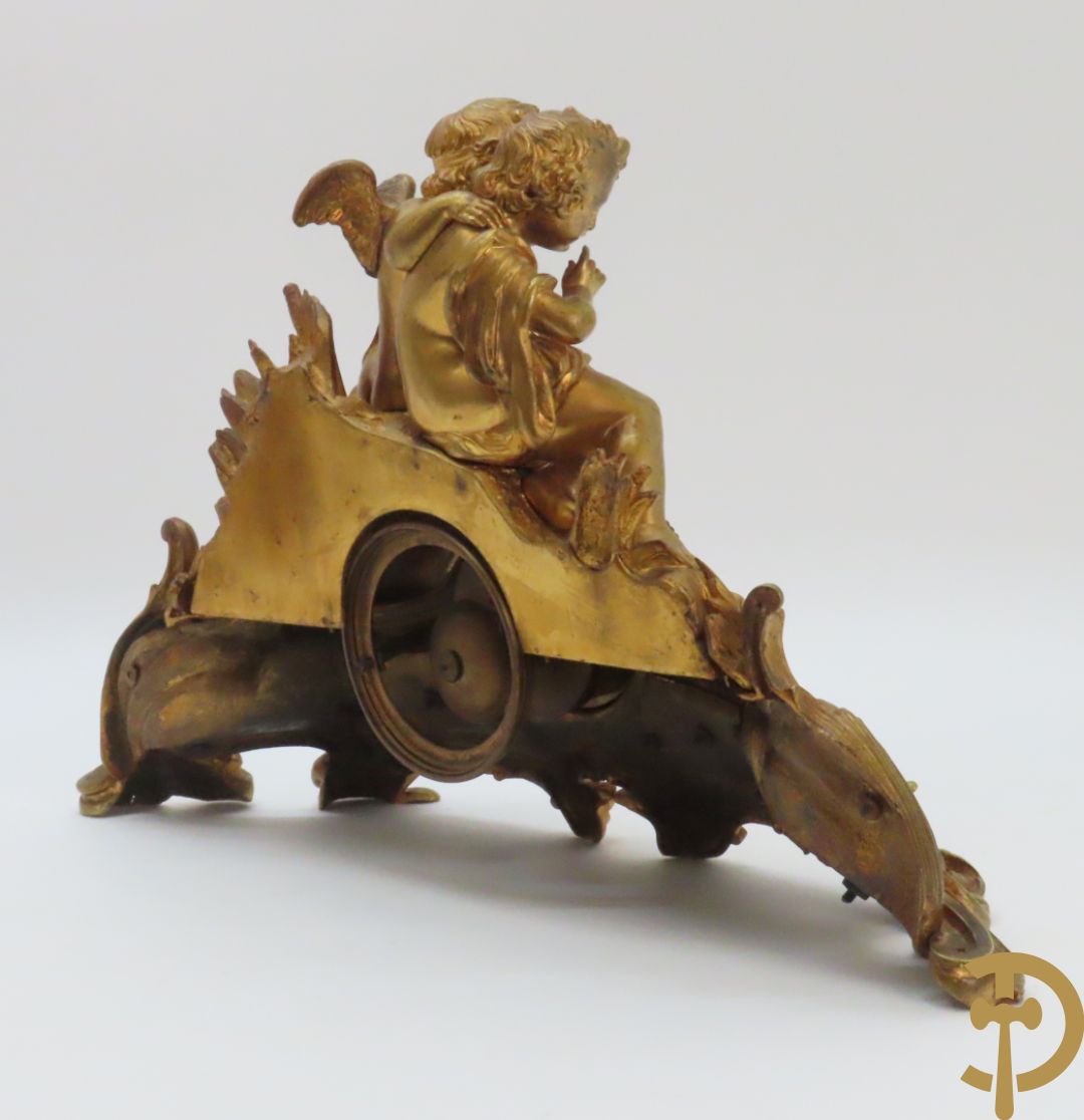Bronzen schouwklok bezet met 2 cupido
