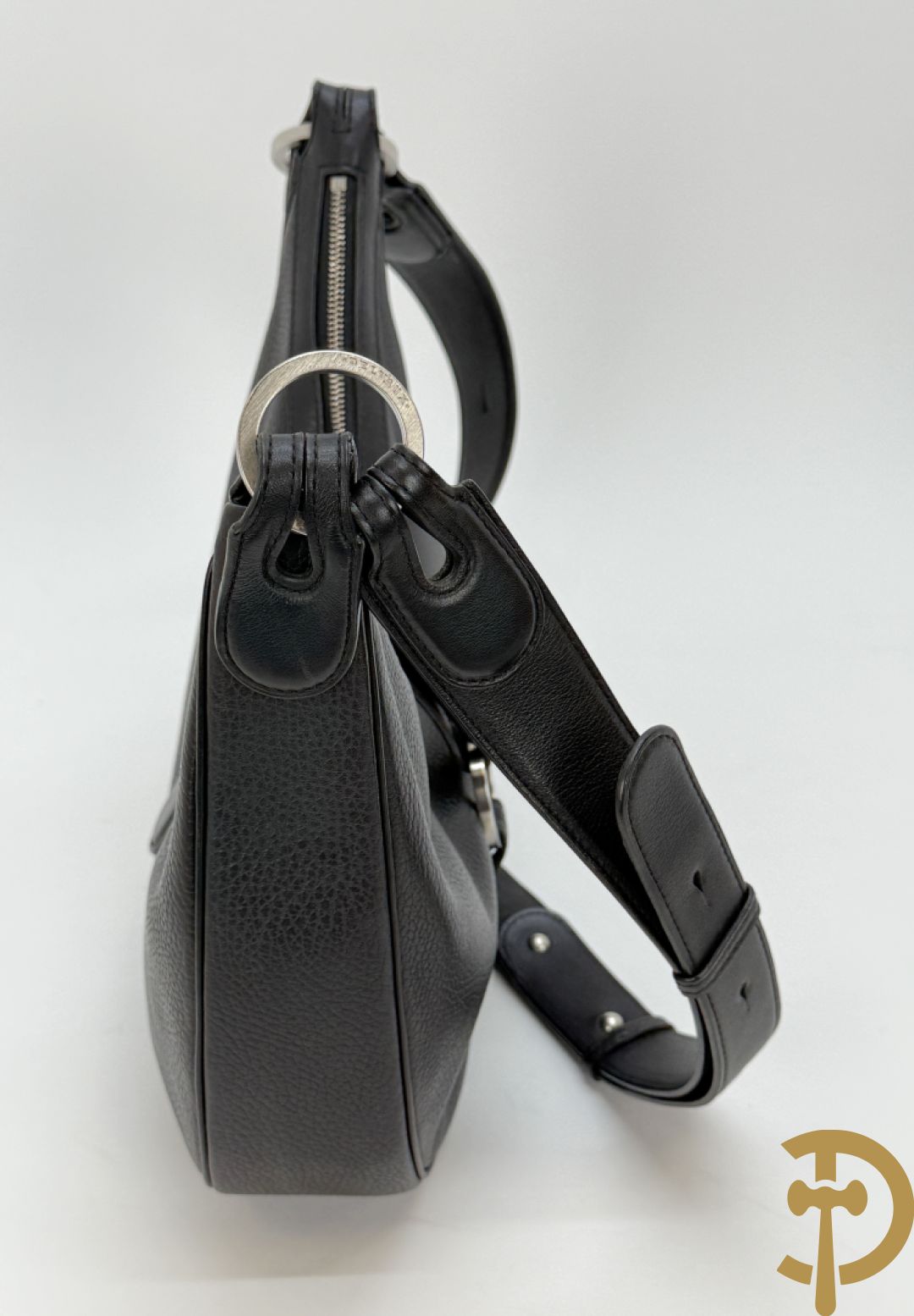 Bruine en zwart lederen handtas Delvaux + boek van Delvaux met documentatie