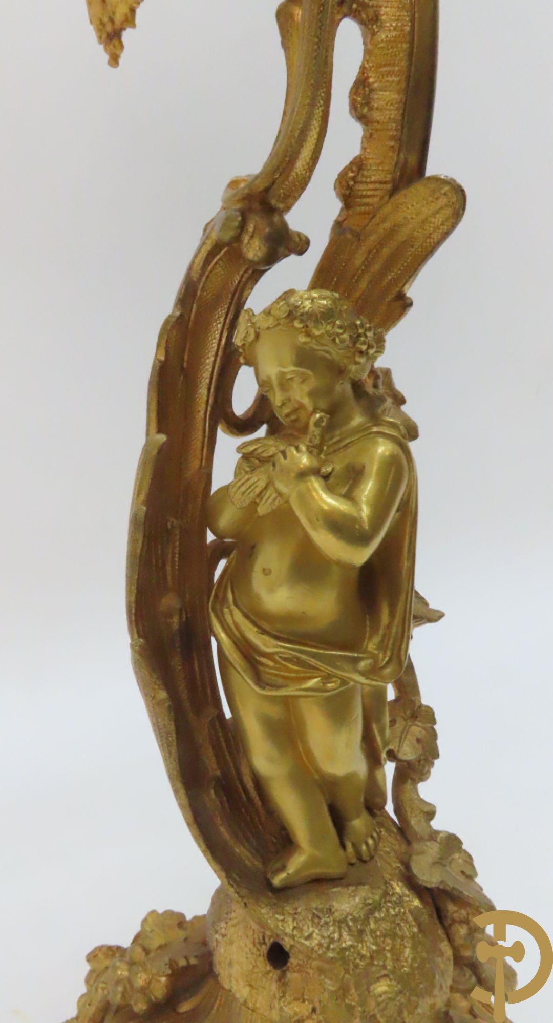 Bronzen schouwklok bezet met 2 cupido