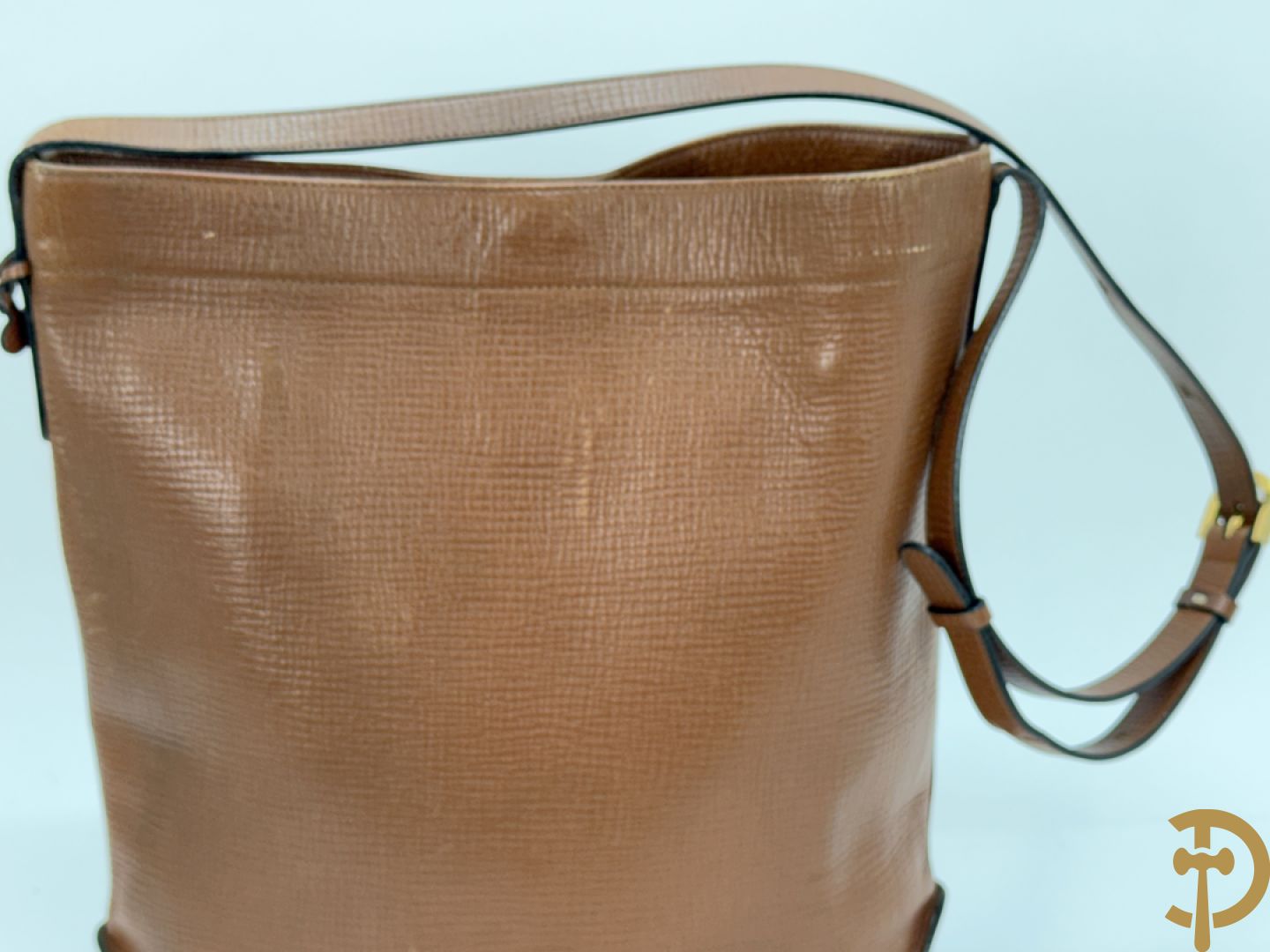 Bruine en zwart lederen handtas Delvaux + boek van Delvaux met documentatie