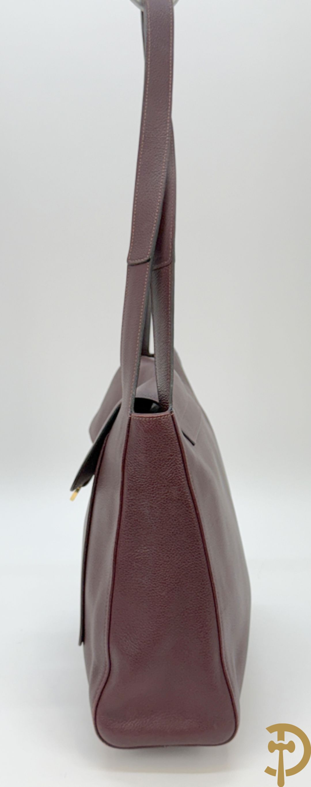 Mooi lederen auberginekleurige handtas Delvaux met bijhorende zak