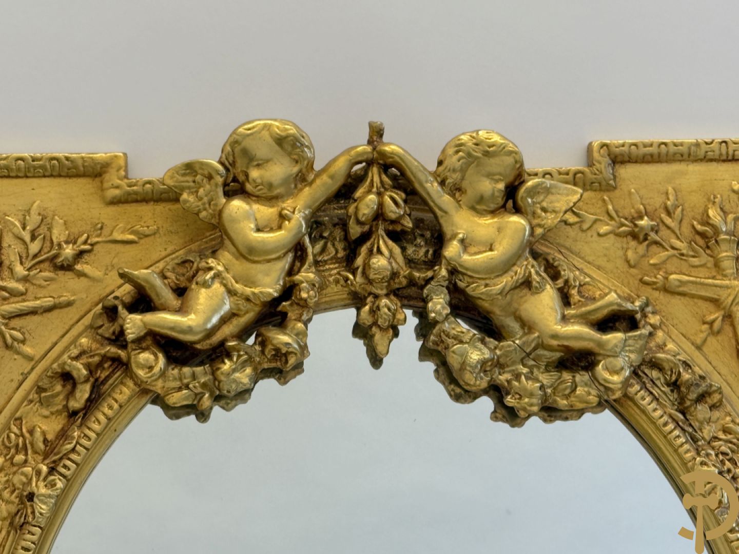 Ovale spiegel met cupido