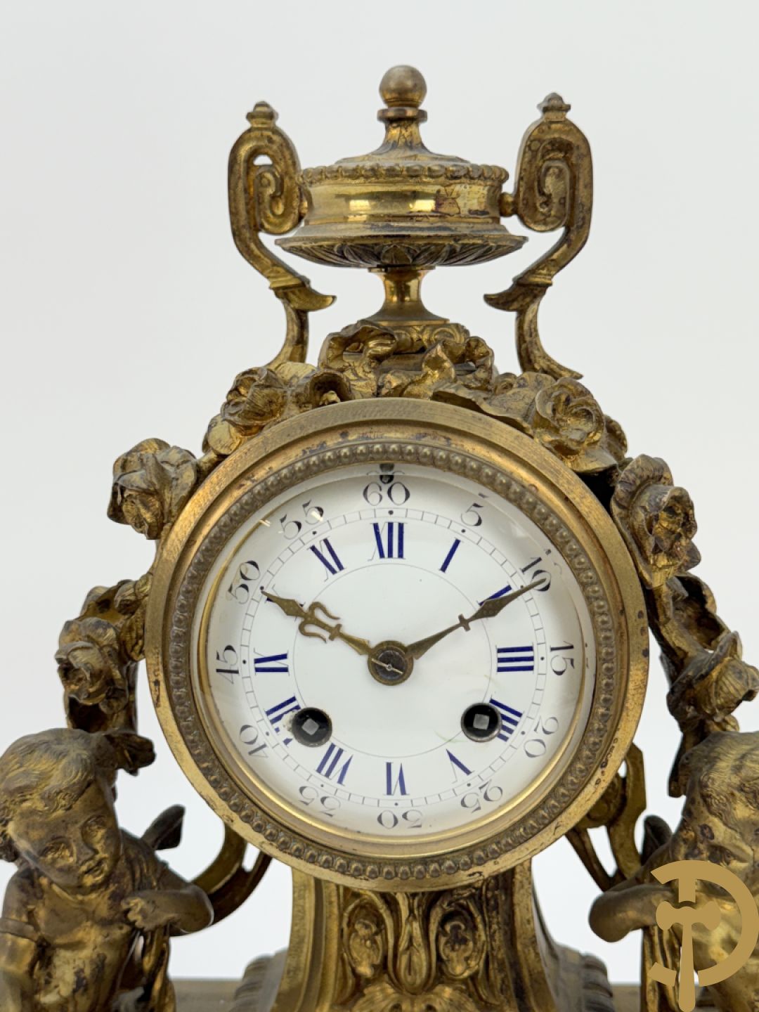 Bronzen pendule met paar cupido