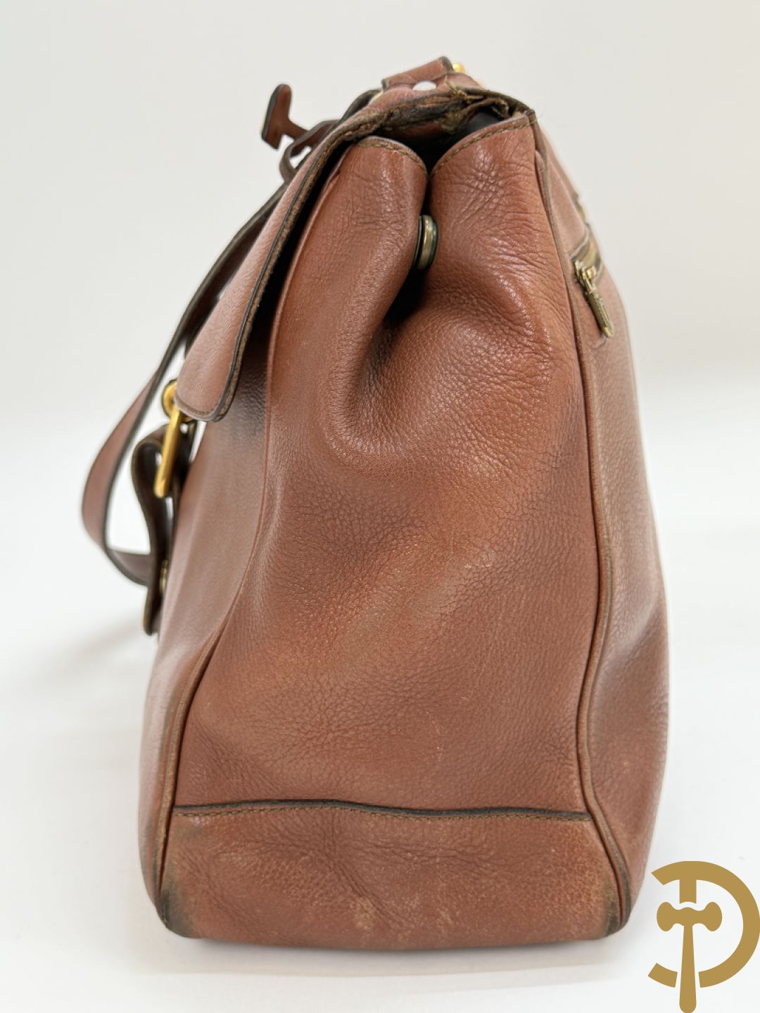 Bruin lederen handtas Delvaux + cognac lederen schoudertas Equivoque Delvaux