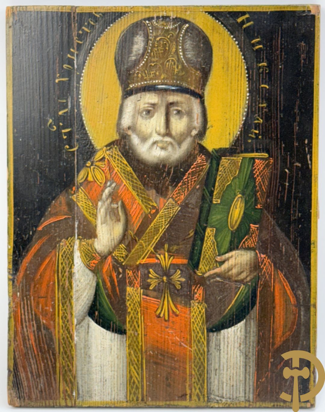 Oude ikoon Heilige met boek