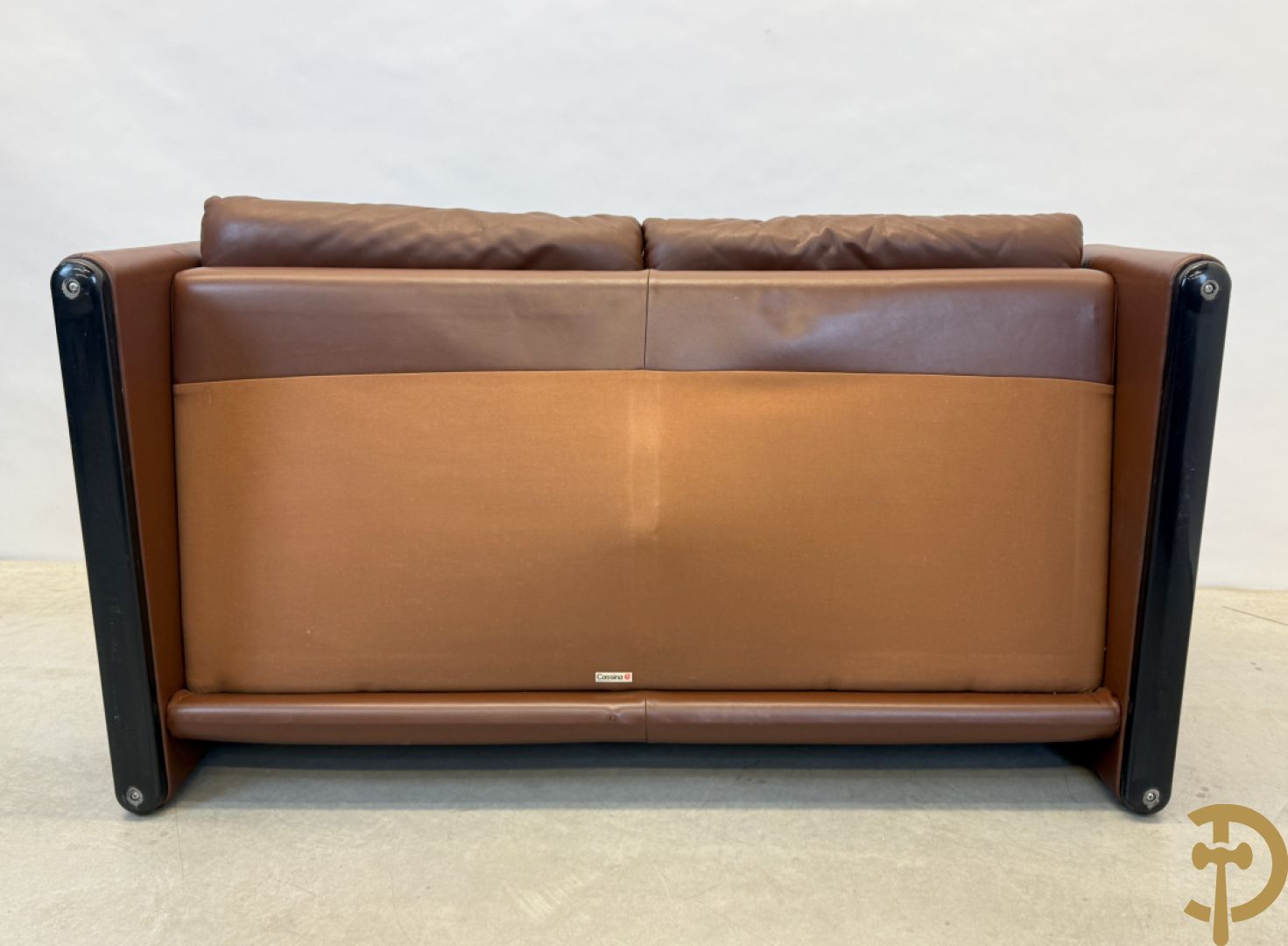 Paar bruin lederen canapé