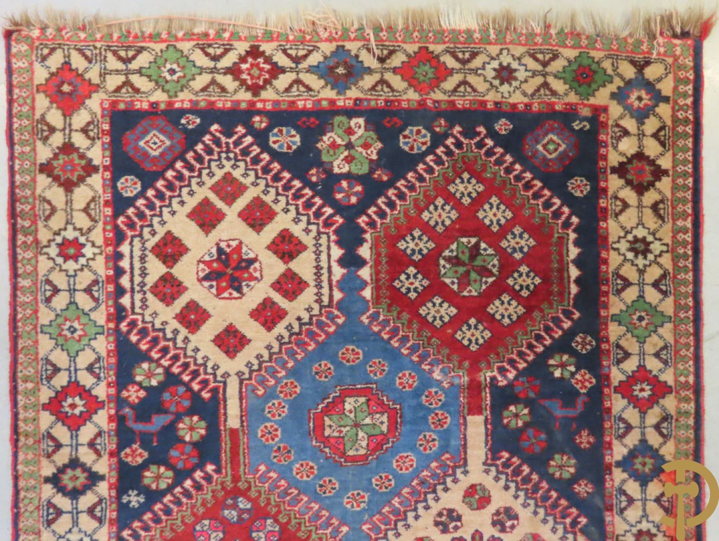 Drie oosterse handgeknoopte tapijten Kaukasus