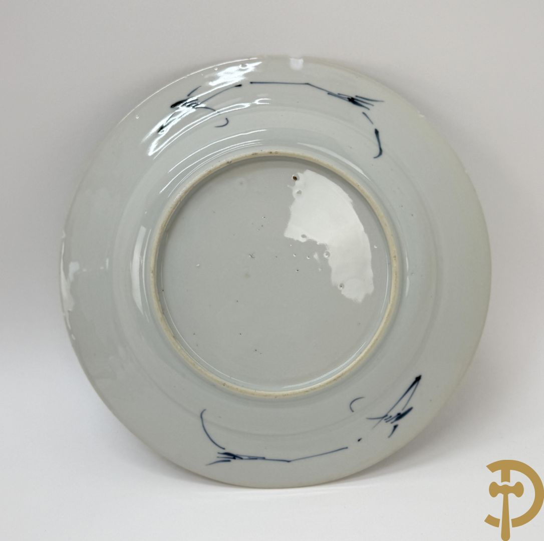 Acht Chinese porseleinen blauw/wit bordjes met bloemendecor, Kangxi