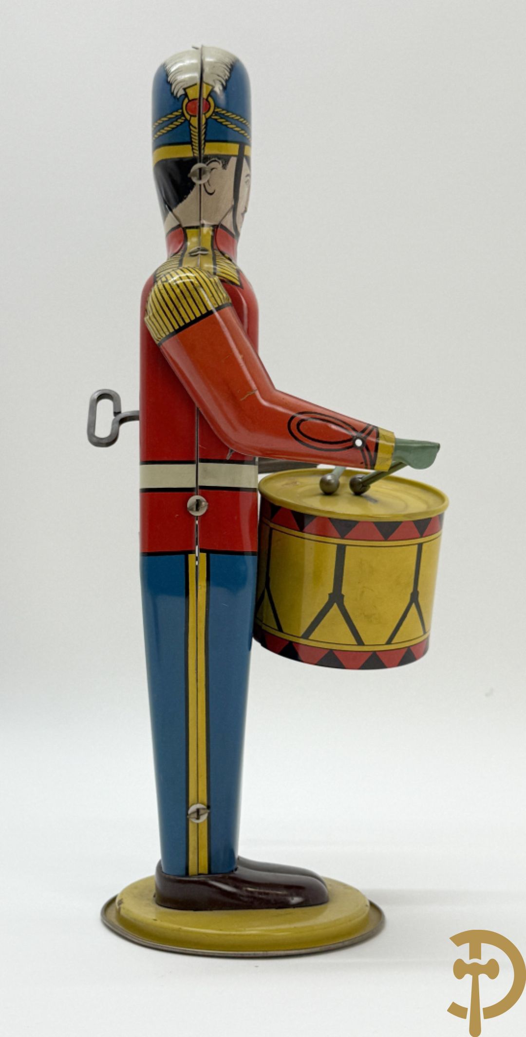 Antieke Engelse speelgoedtrommelaar, Drum Major made by Wolvering supply by Pittsburgh