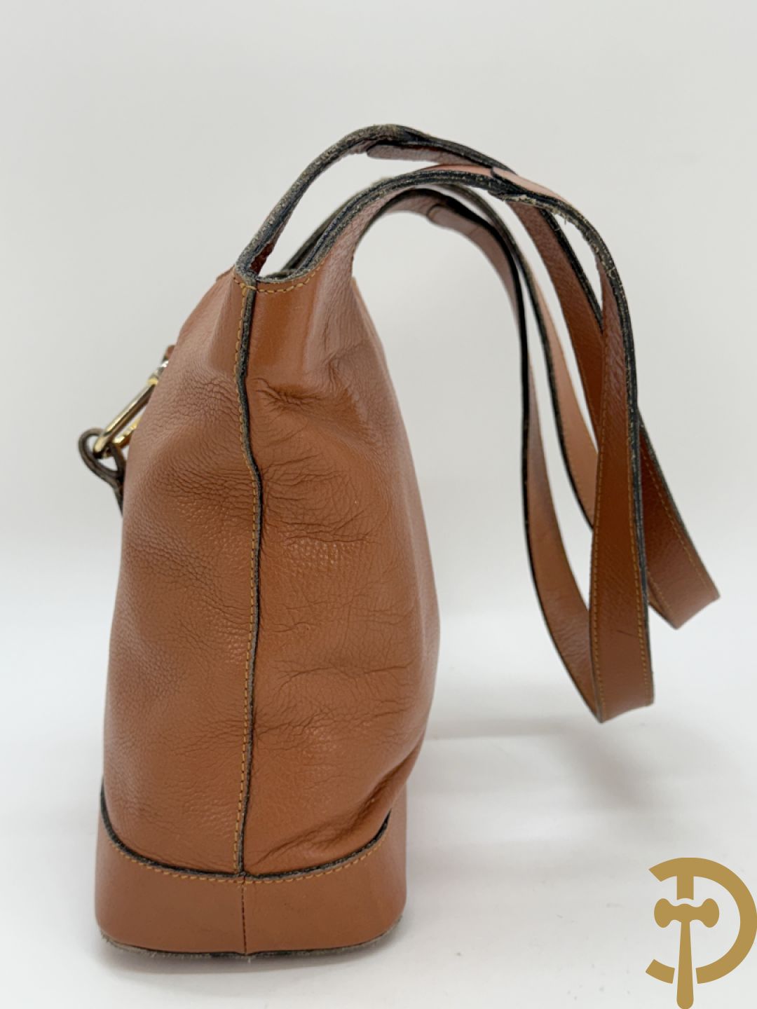 Schoudertas Delvaux met koperen boekel, model Trotteur