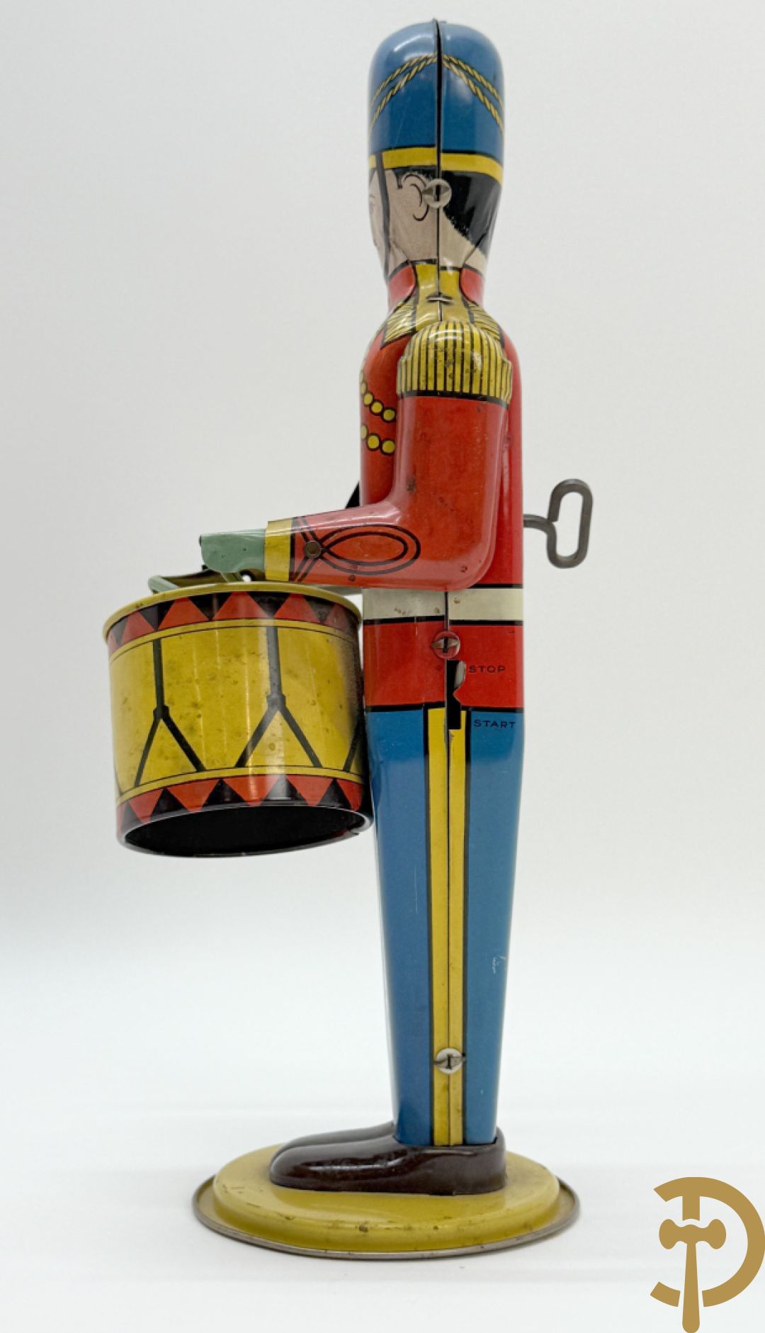 Antieke Engelse speelgoedtrommelaar, Drum Major made by Wolvering supply by Pittsburgh