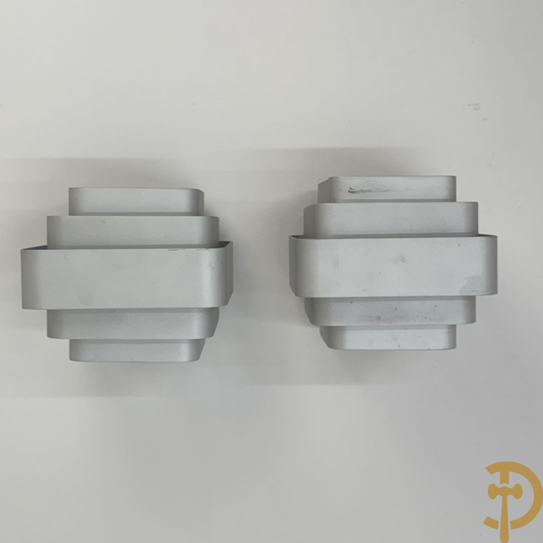 Paar wandlampen in zilverkleur naar Jules Wabbes, uitgegeven door Wever & Ducré