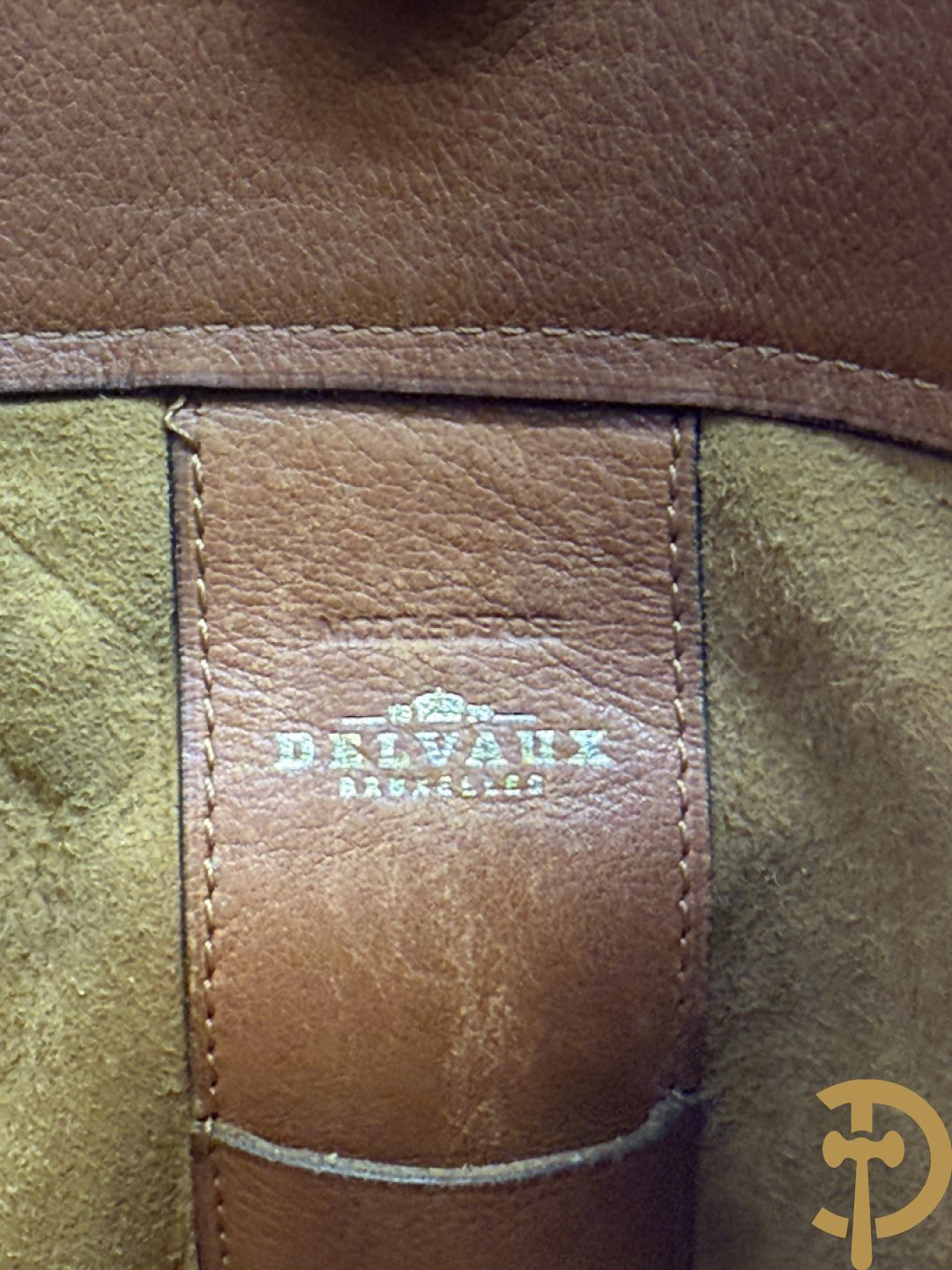 Bruin lederen handtas Delvaux + cognac lederen schoudertas Equivoque Delvaux