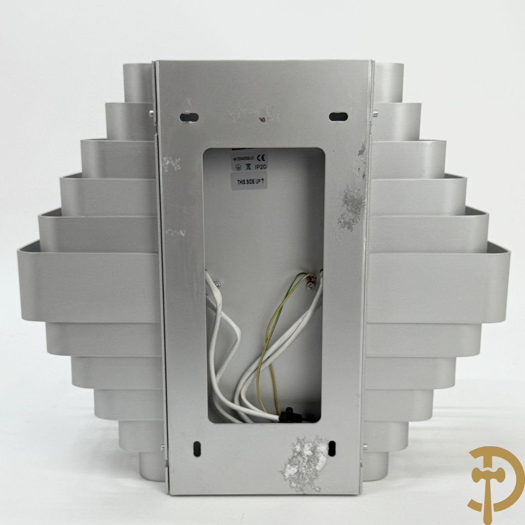 Paar verzilverde wandlampen naar model van Jules Wabbes, uitgegeven door Wever & Ducré