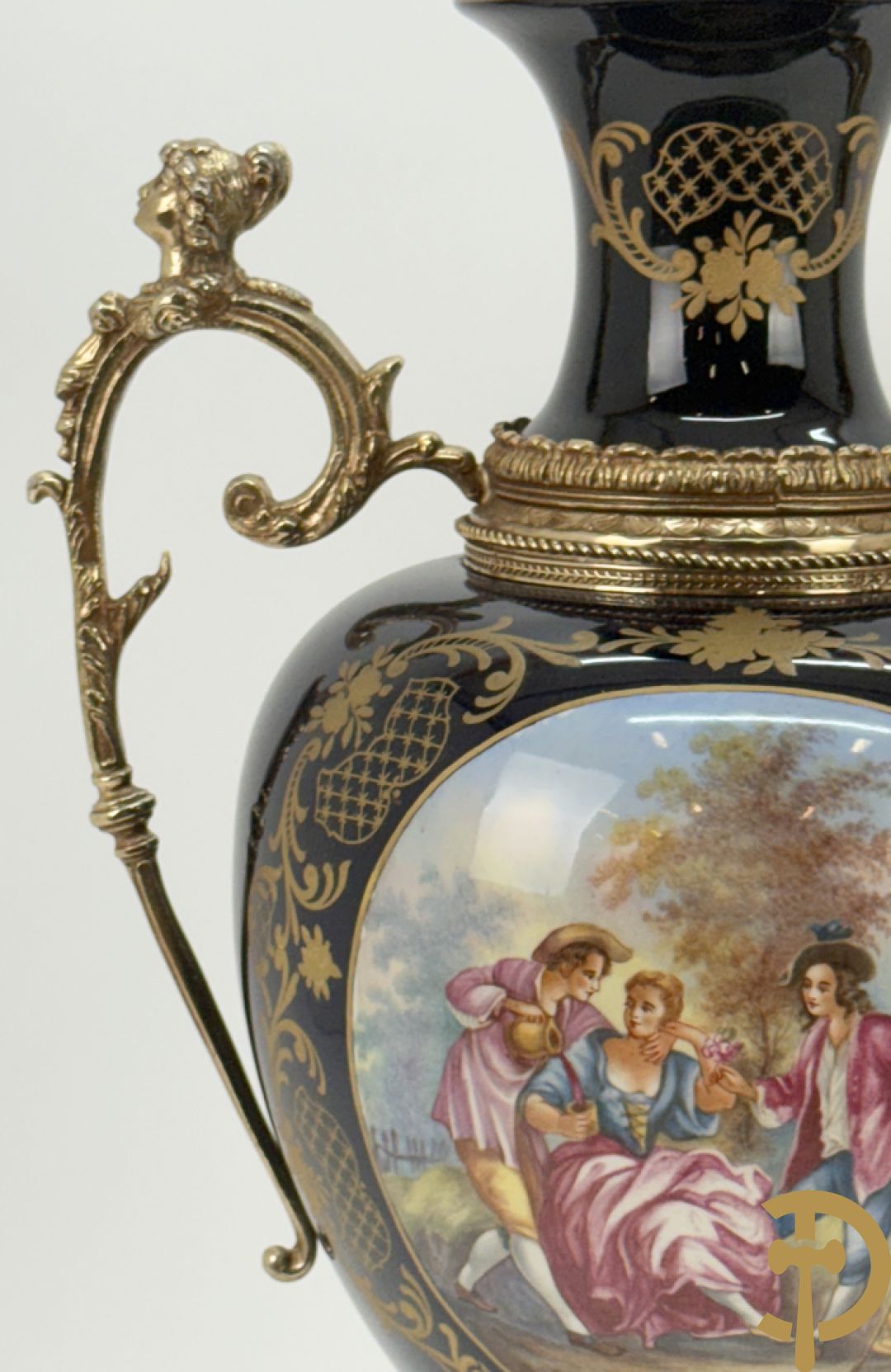 Onleesbaar getekend Sèvres stijl vaas met geanimeerd landschapsdecor en zijdelings met bronzen ornamenten bezet