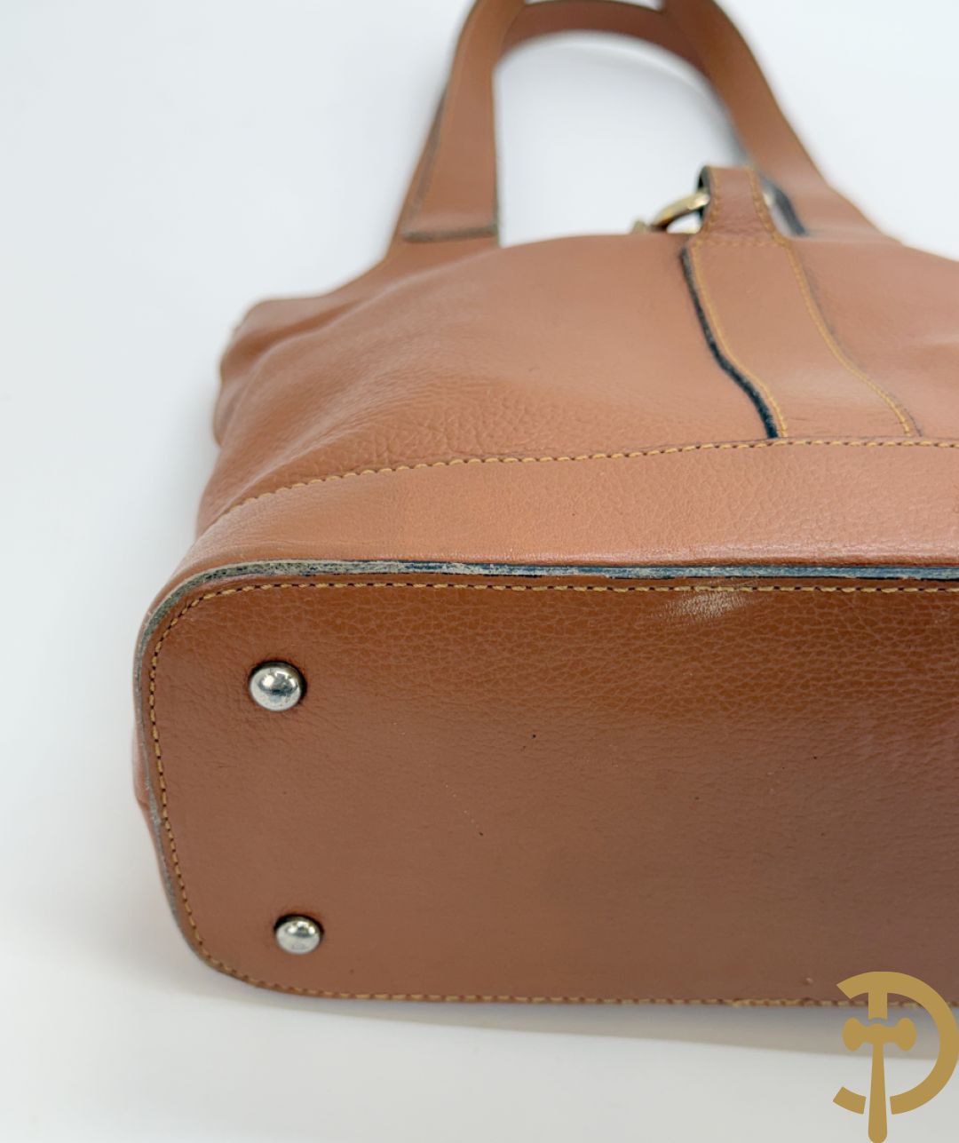 Schoudertas Delvaux met koperen boekel, model Trotteur