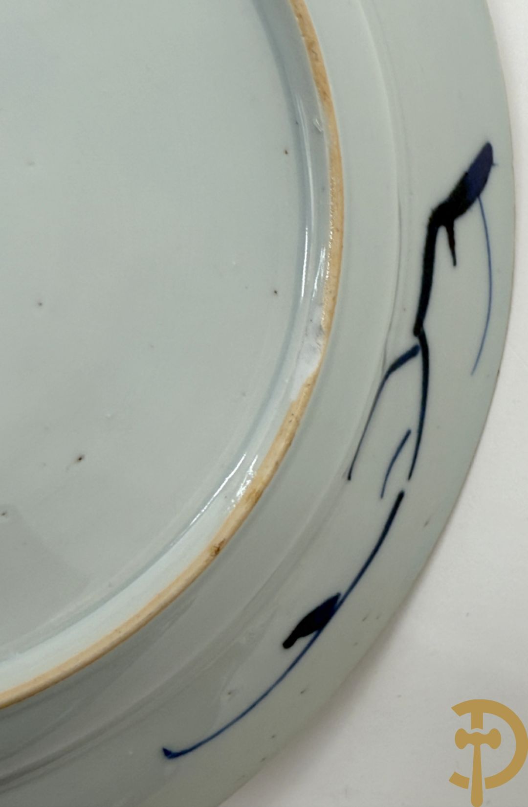 Acht Chinese porseleinen blauw/wit bordjes met bloemendecor, Kangxi