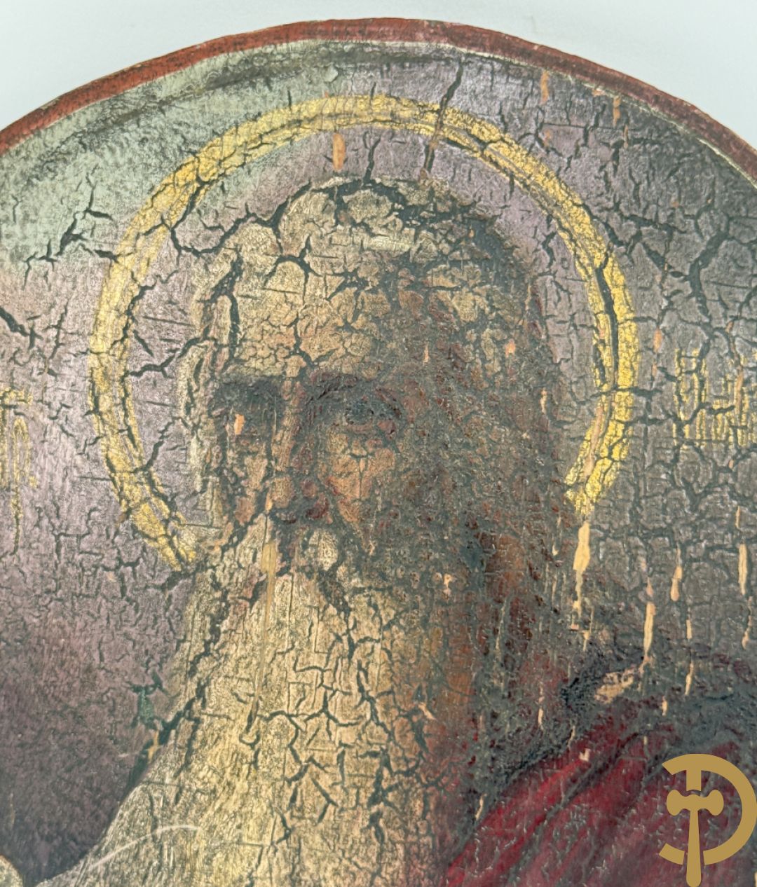 Rond handbeschilderd paneel met evangelist