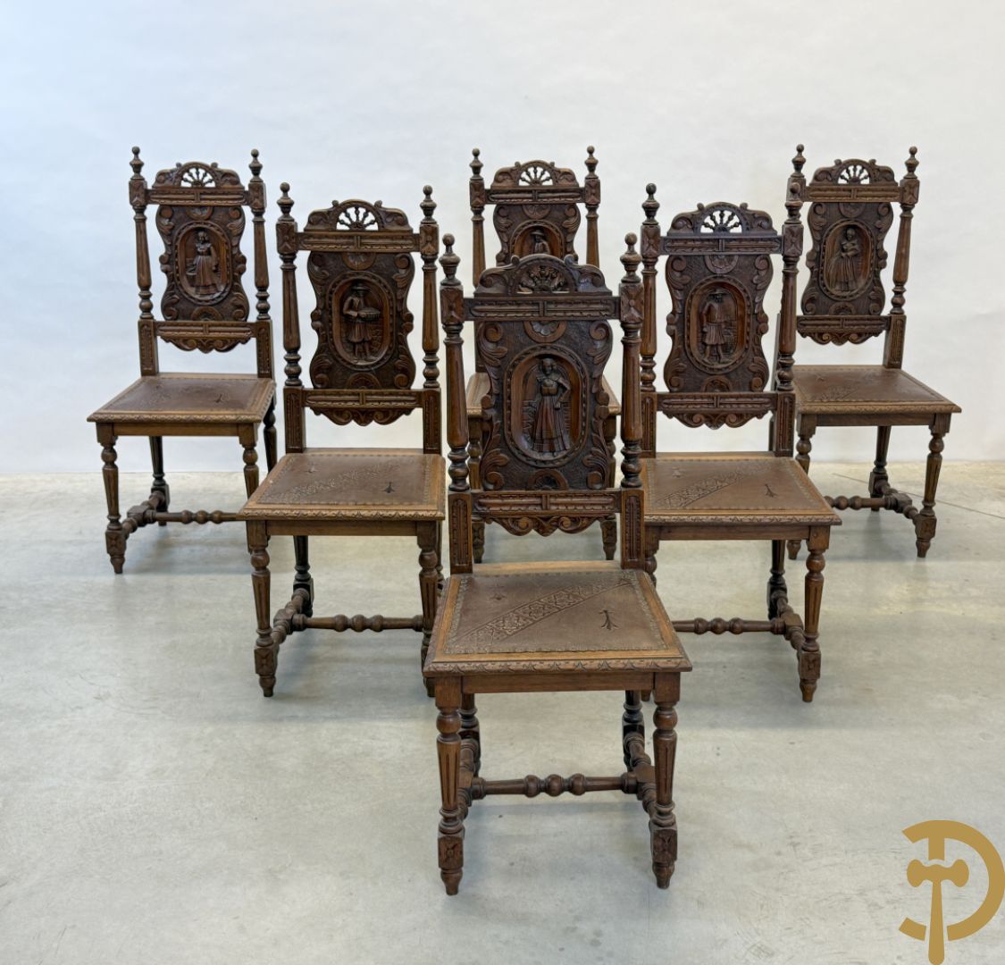 Massief eiken Bretoense eetkamer bestaande uit buffet met 3 deuren boven, 2 deuren onder, lades midden en gesculpteerde geanimeerde scènes + desserte + uittrekbare tafel + 6 stoelen + extra allonge