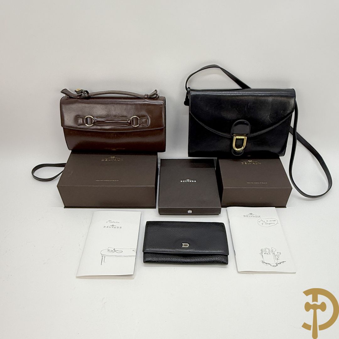 Twee vintage Delvaux handtassen (zwart en bruin) + geldbeugel + lege doosjes