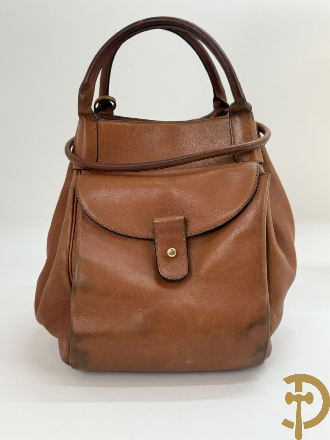 Bruin lederen handtas Delvaux + cognac lederen schoudertas Equivoque Delvaux