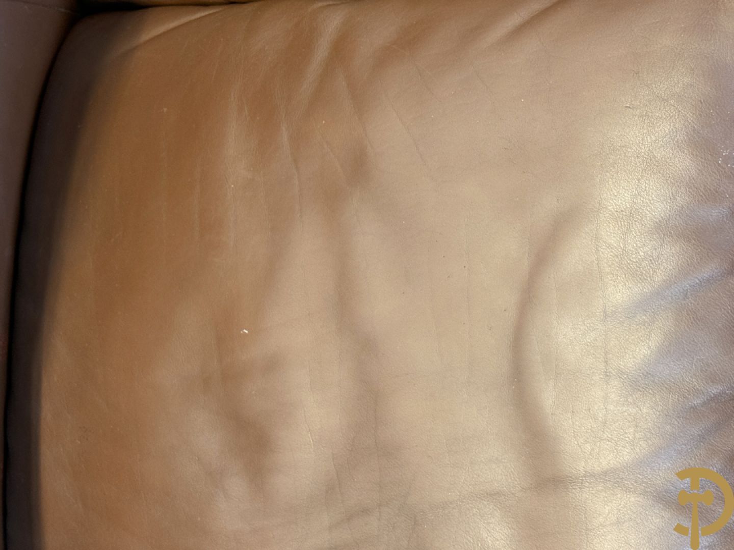 Paar bruin lederen canapé