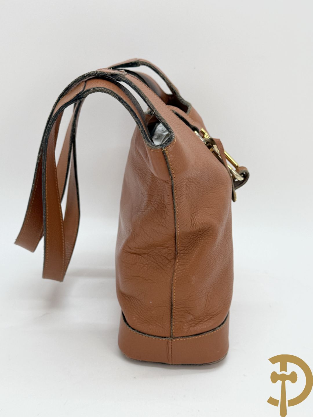 Schoudertas Delvaux met koperen boekel, model Trotteur