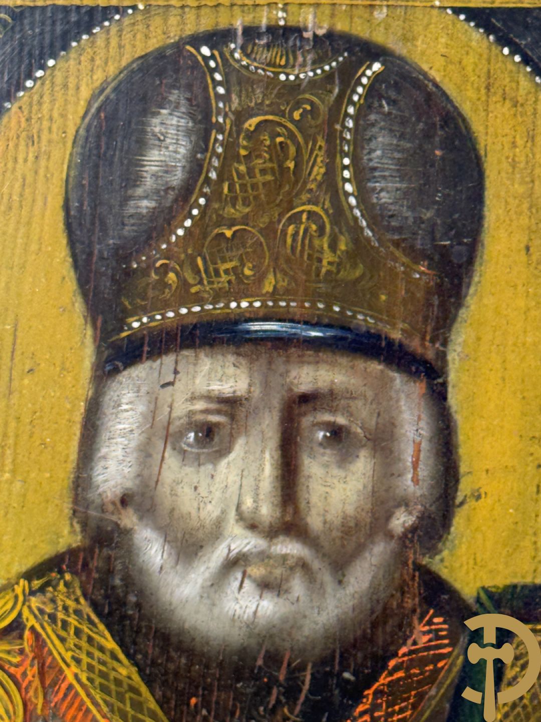 Oude ikoon Heilige met boek