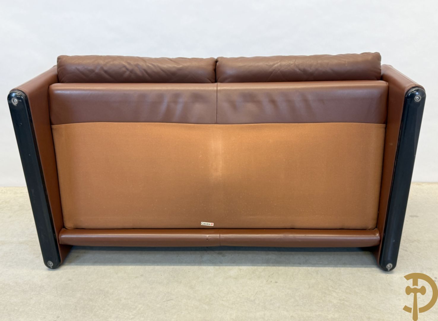 Paar bruin lederen canapé