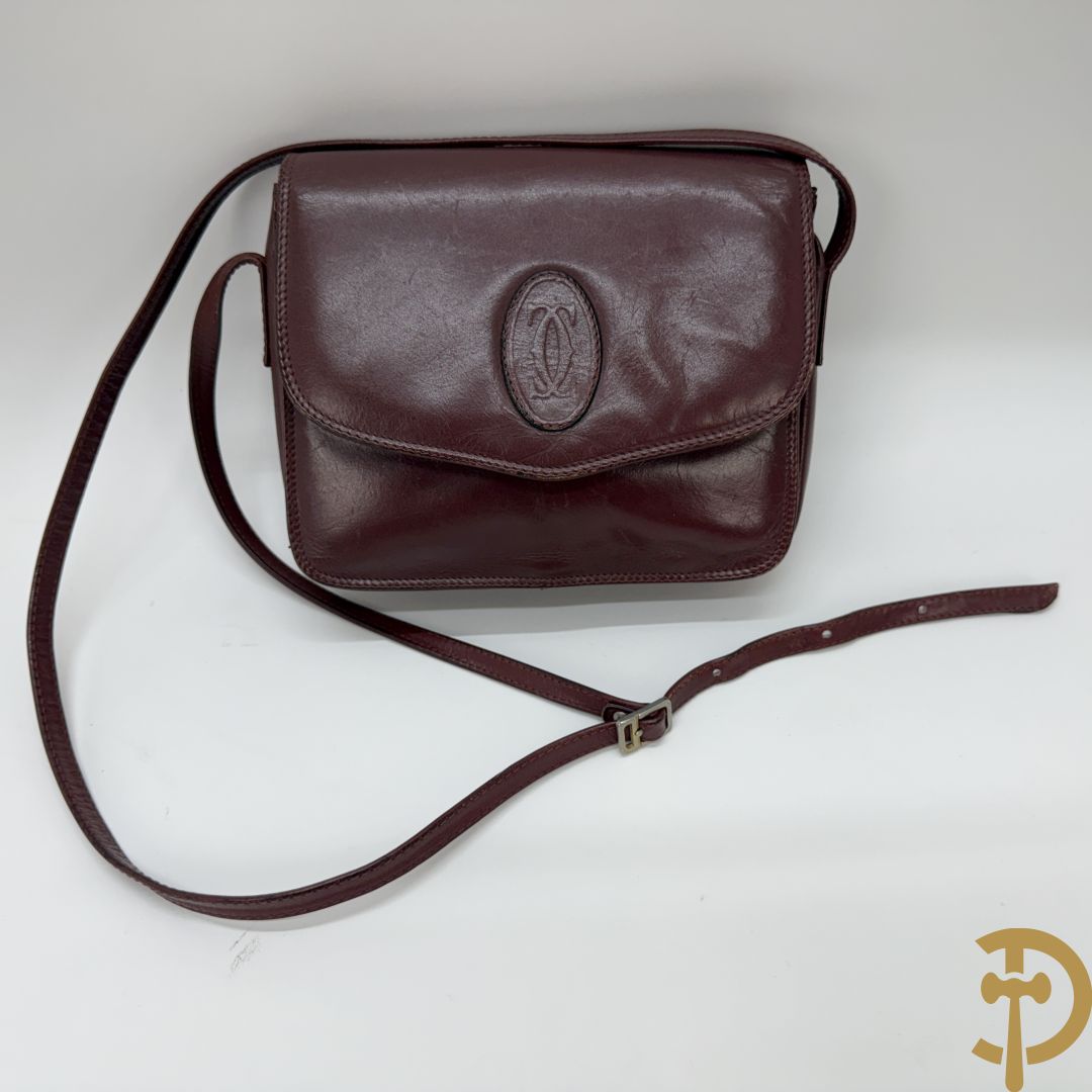 Bordeaux lederen aktentas Cartier + handtas Cartier
