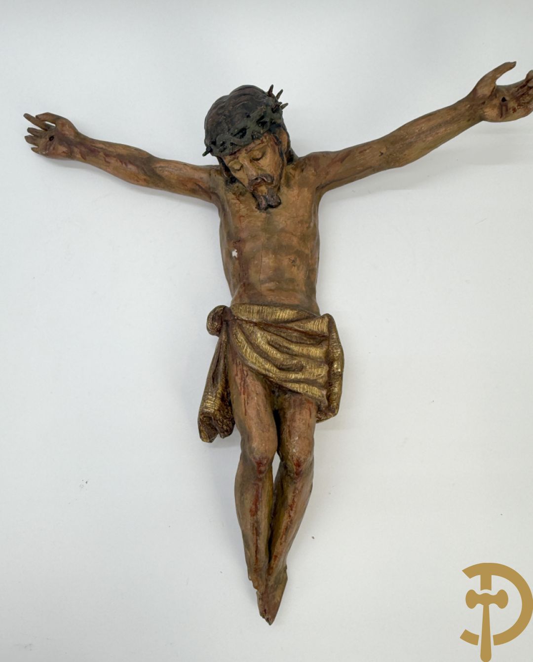 Twee houtgesculpteerde en gepolychromeerde corpussen