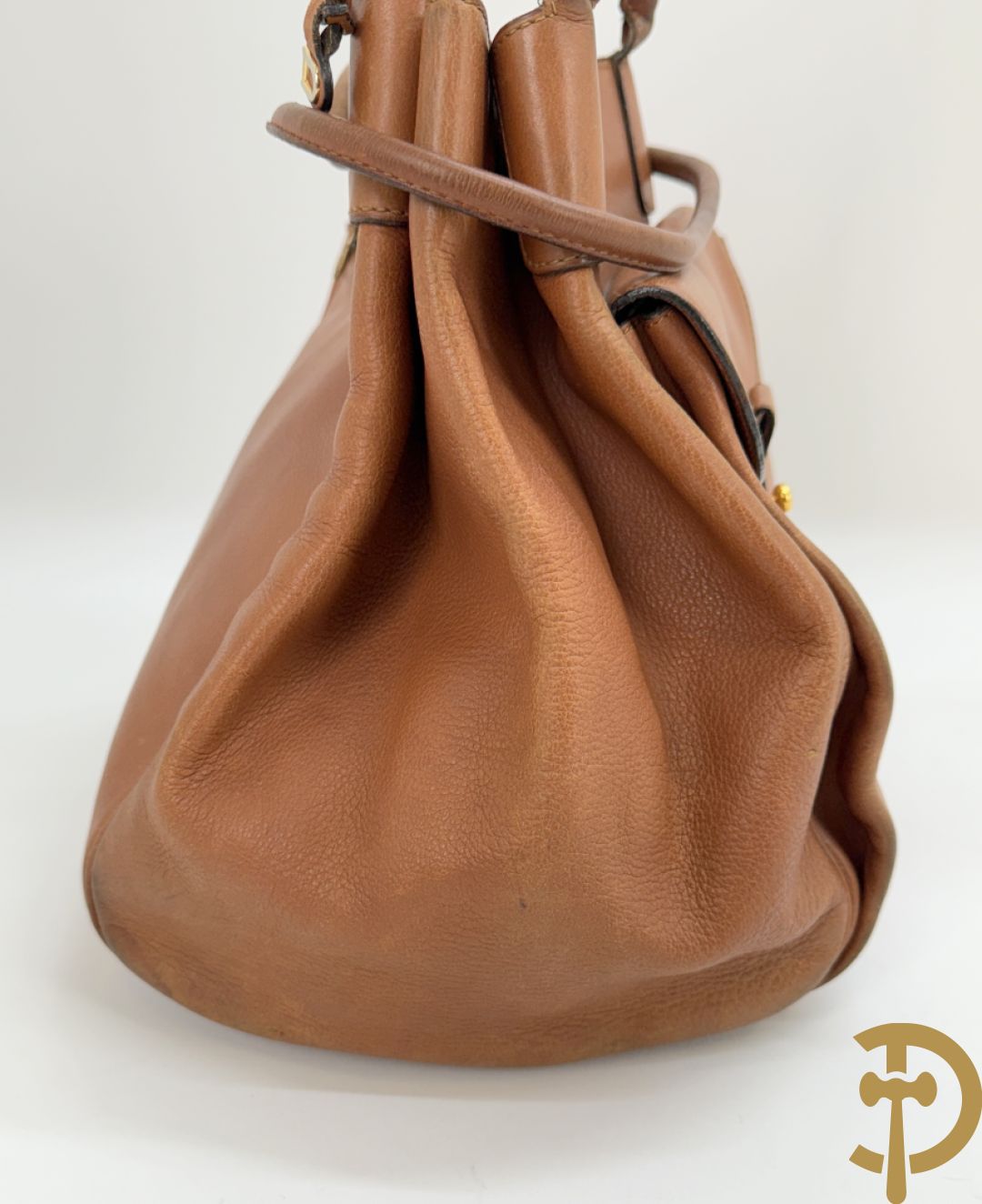 Bruin lederen handtas Delvaux + cognac lederen schoudertas Equivoque Delvaux