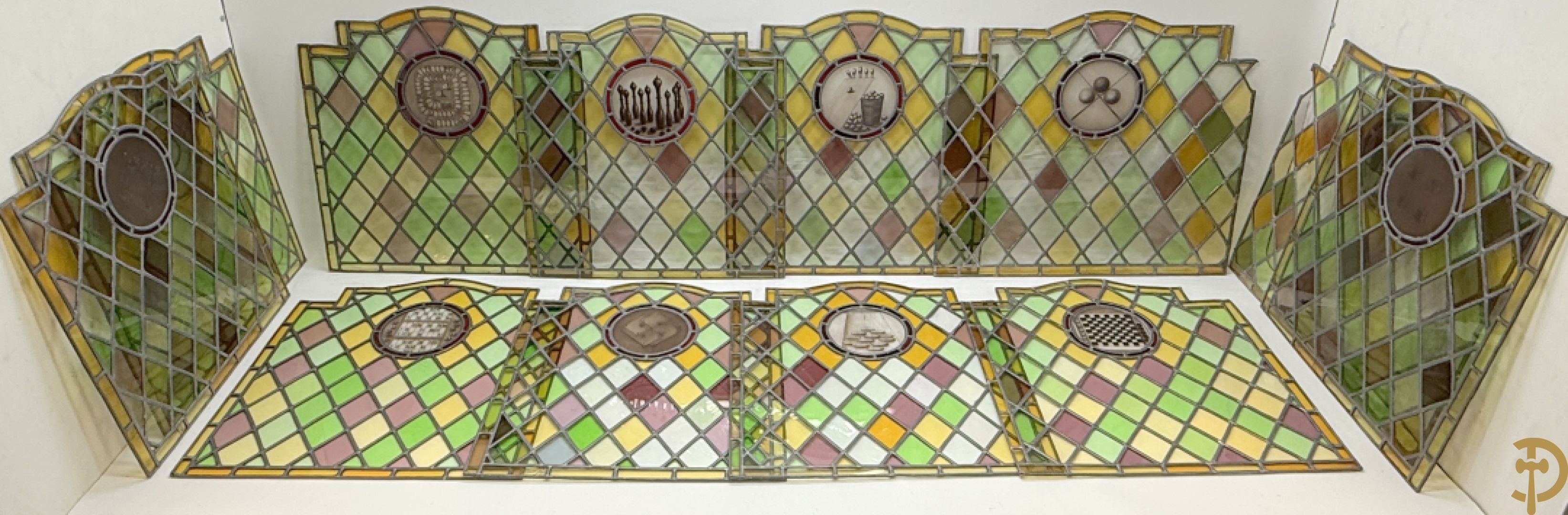 Twaalf loodramen met afbeeldingen van volksspelen