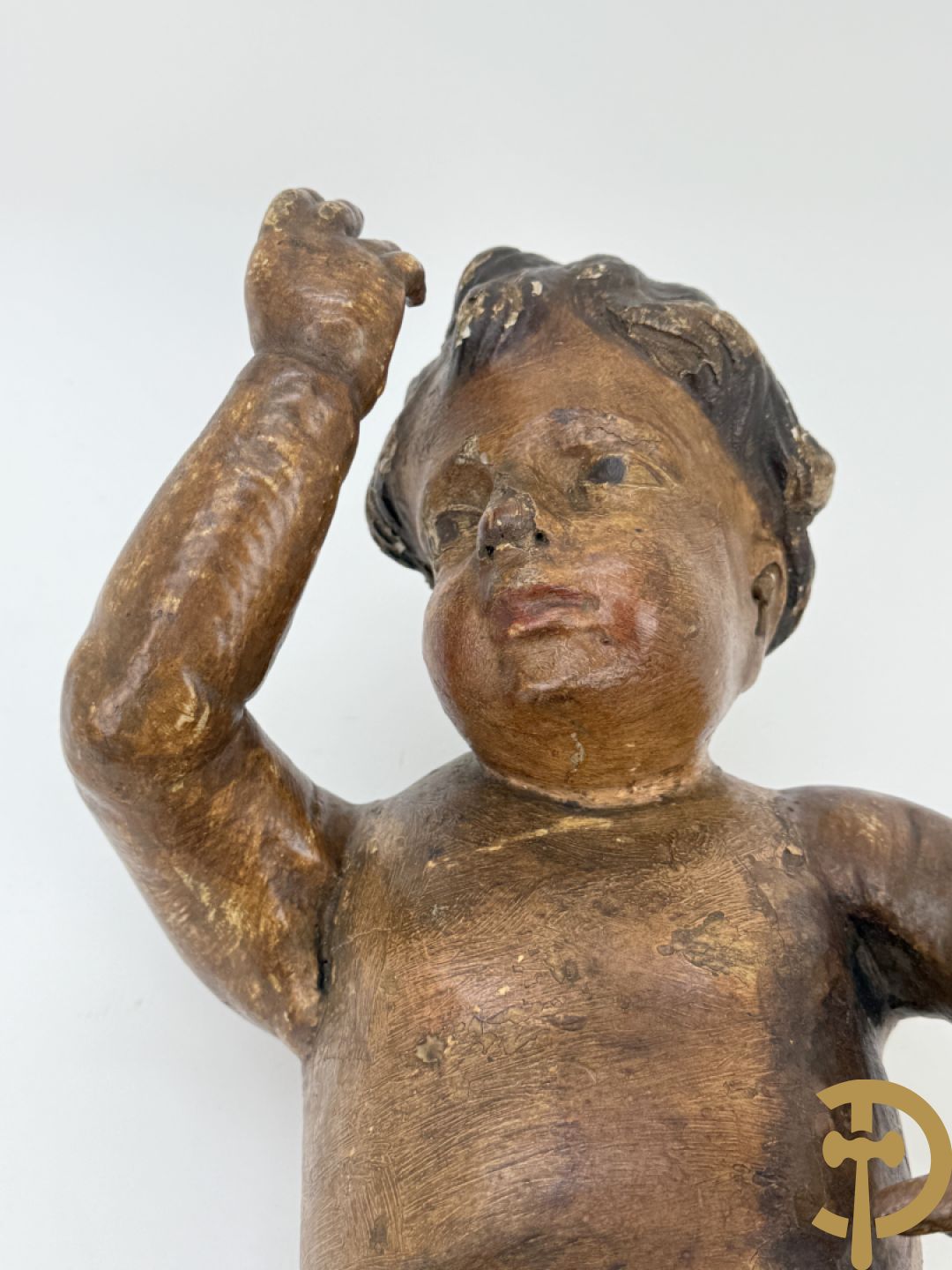 Paar houtgesculpteerde en gepolychromeerde cupido