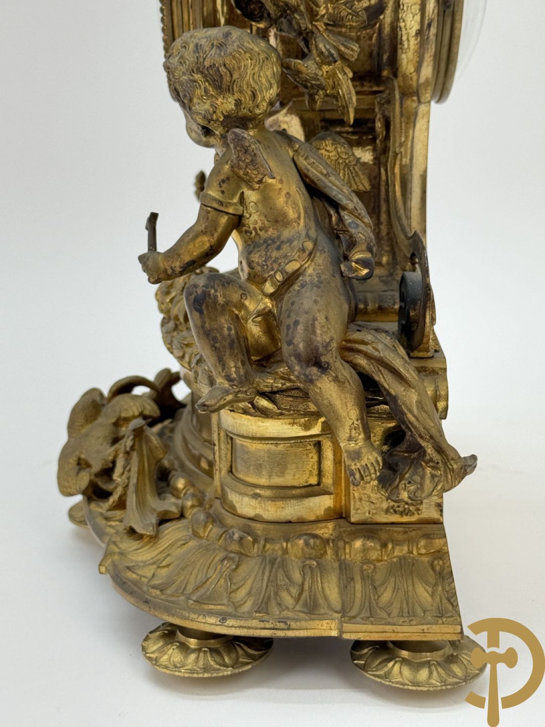 Bronzen pendule met paar cupido