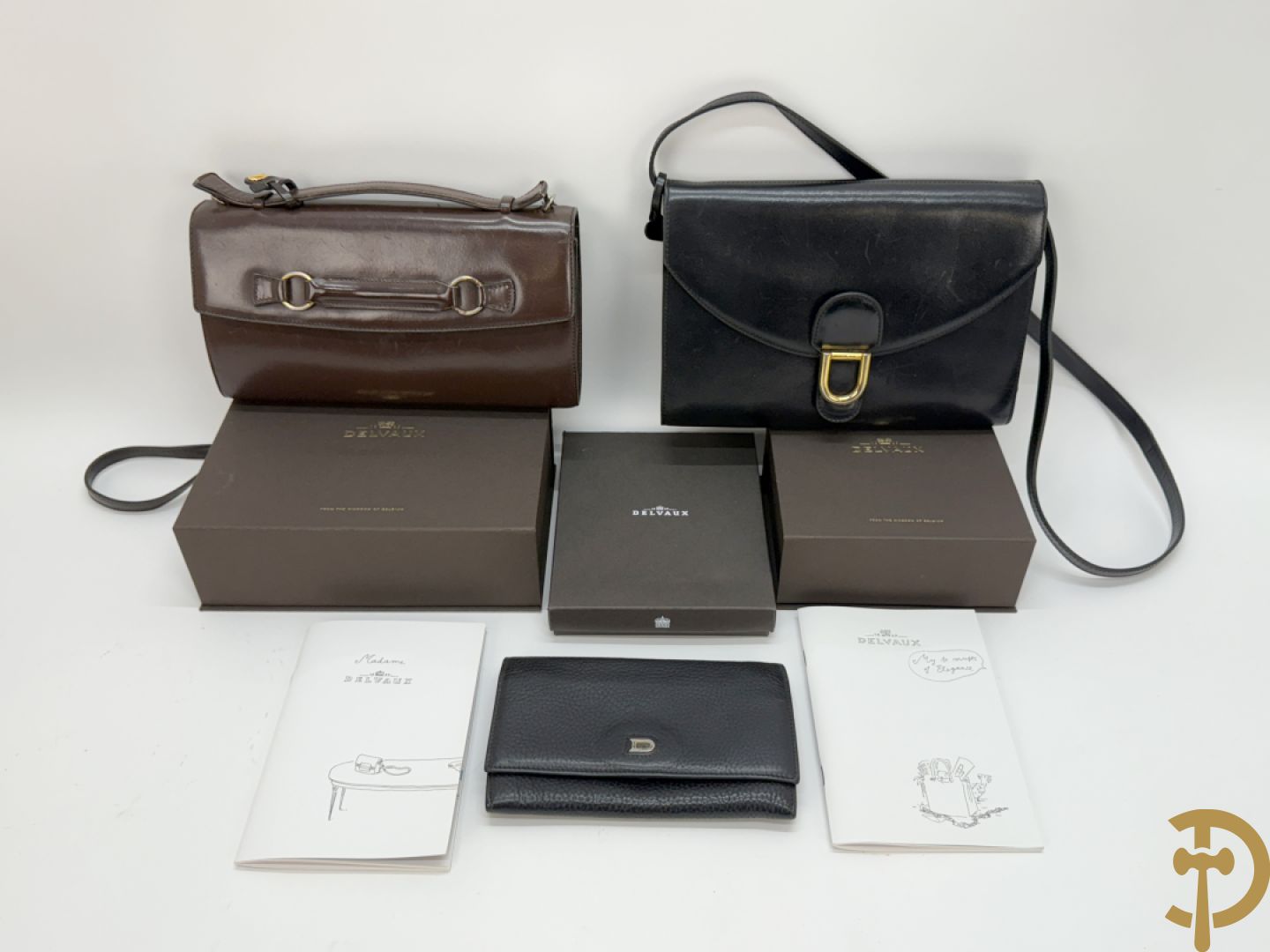 Twee vintage Delvaux handtassen (zwart en bruin) + geldbeugel + lege doosjes