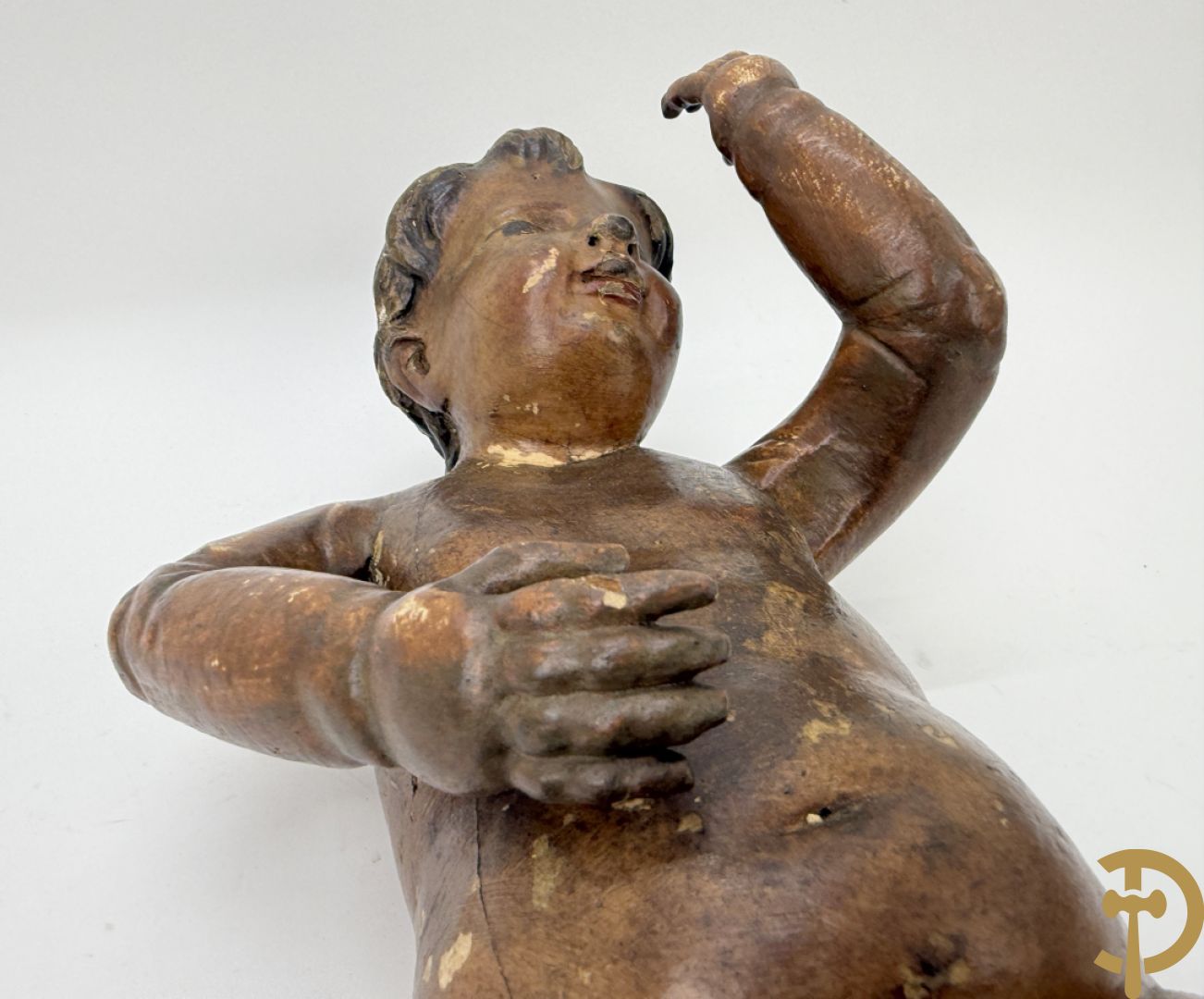 Paar houtgesculpteerde en gepolychromeerde cupido