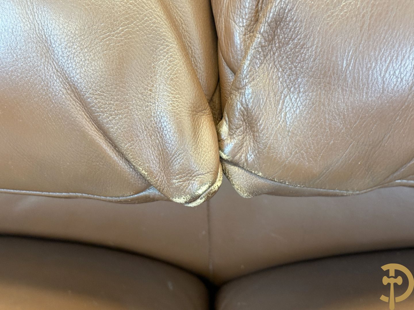 Paar bruin lederen canapé