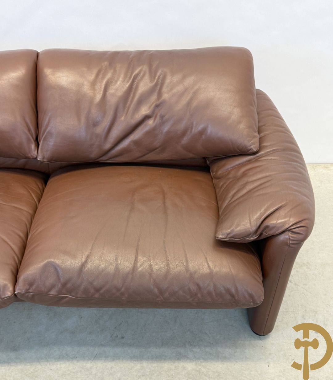 Paar bruin lederen canapé