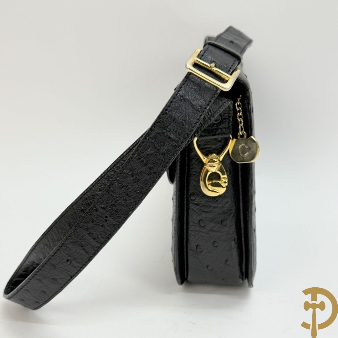 Vintage handtas in struisvogelleder met koperen ornament, Celine Paris, met bijhorende stofzak