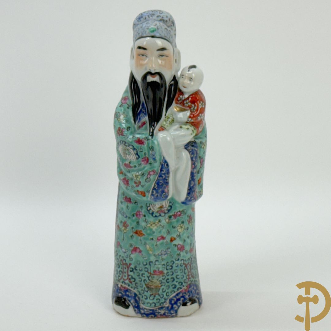 Chinese porseleinen wijsgeer met kind op de arm