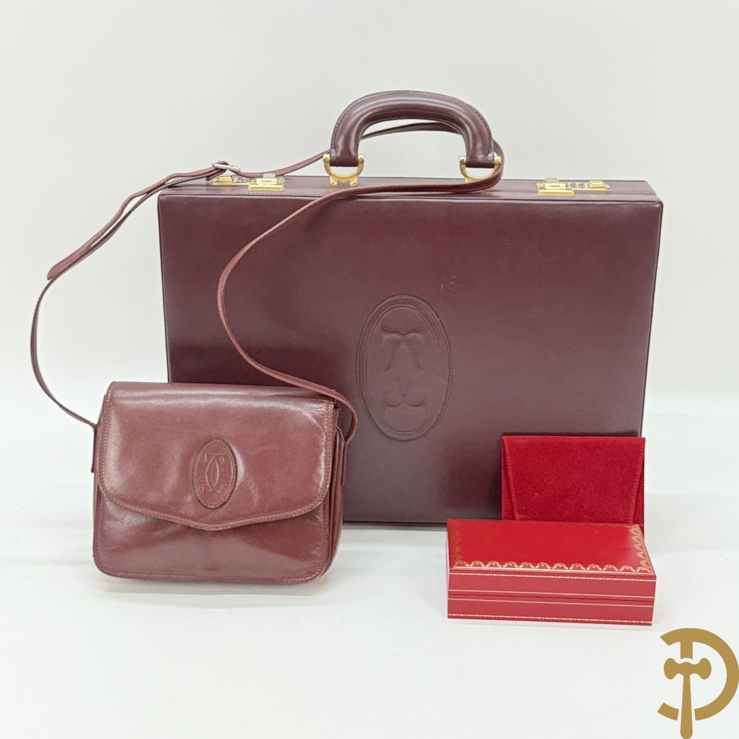 Bordeaux lederen aktentas Cartier + handtas Cartier