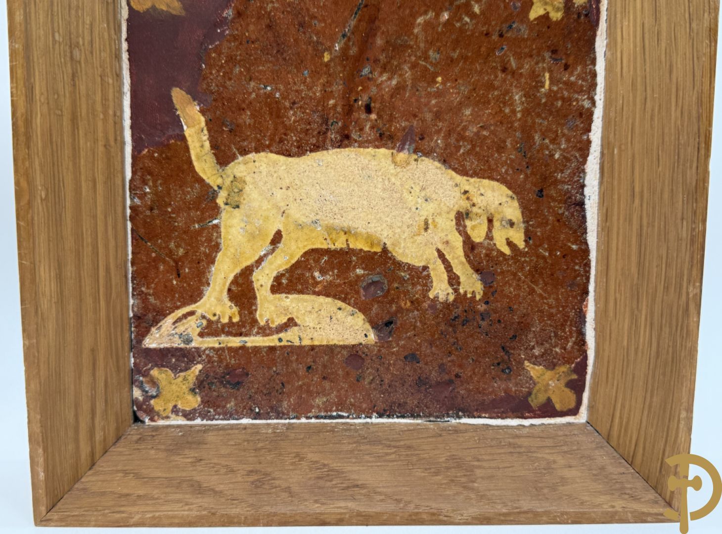 Paar 18e Vlaamse tegels met jager en hond ingelijst in kader