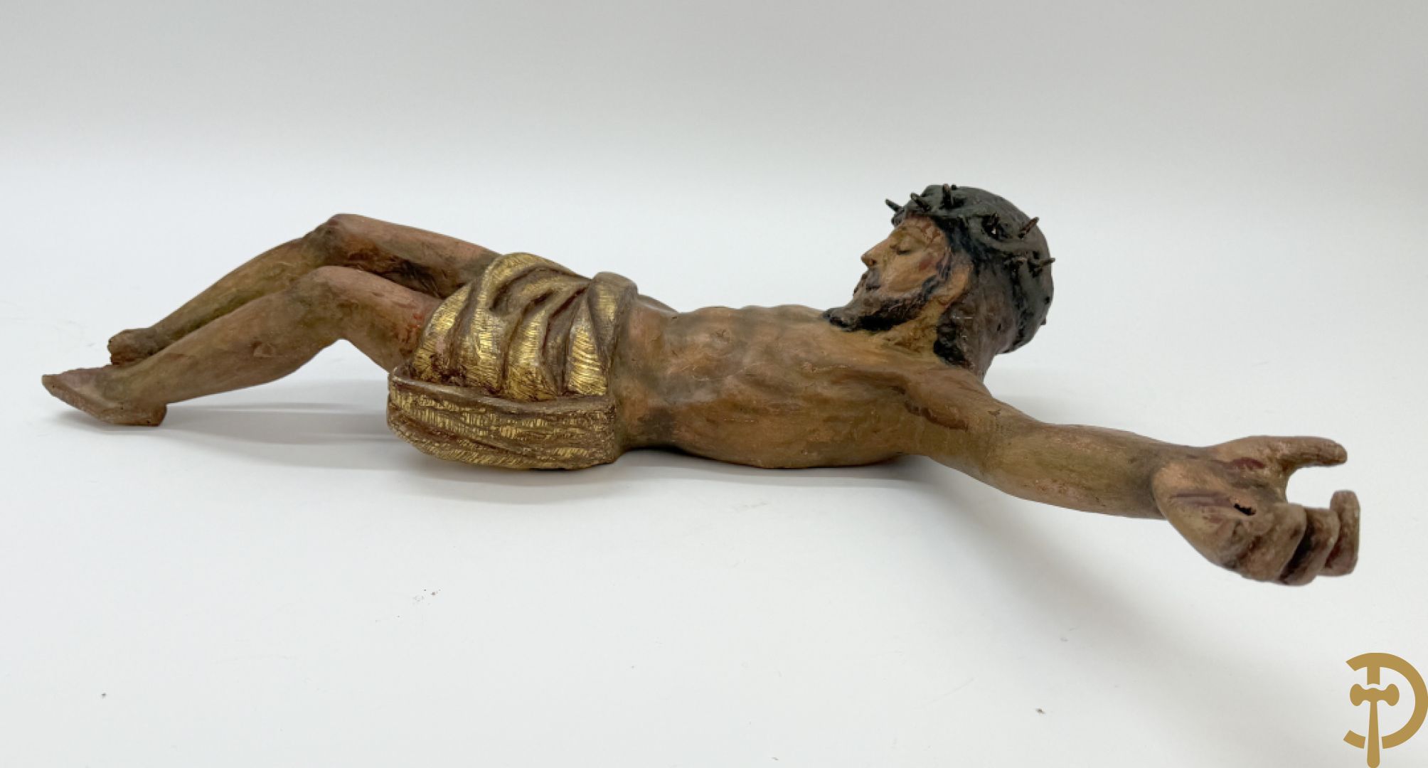 Twee houtgesculpteerde en gepolychromeerde corpussen