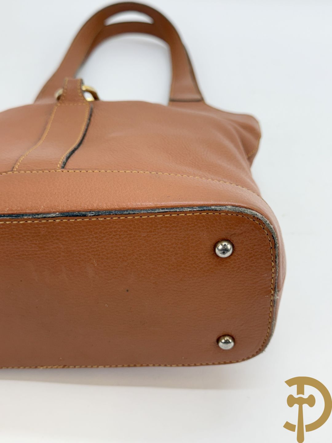 Schoudertas Delvaux met koperen boekel, model Trotteur