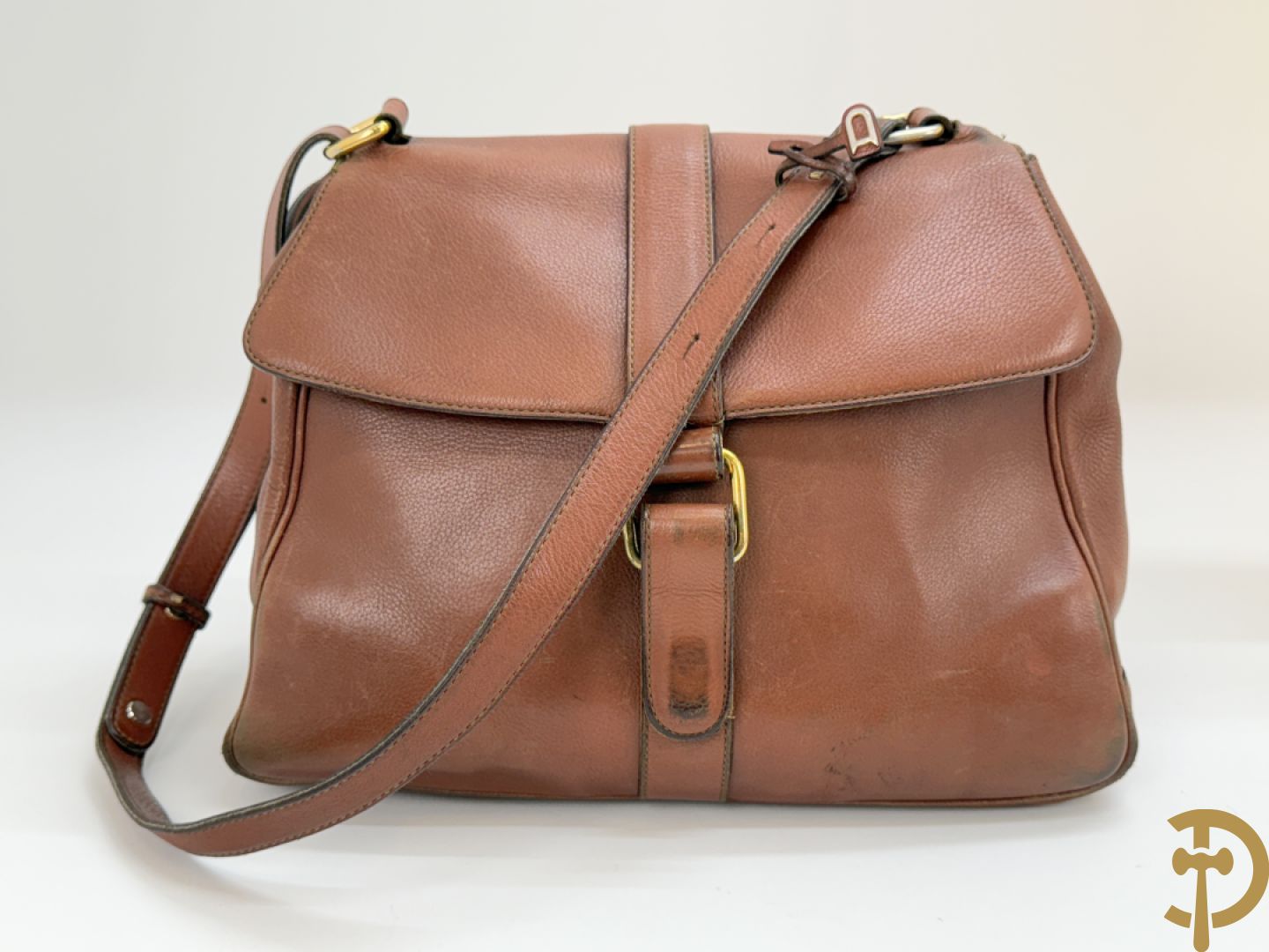 Bruin lederen handtas Delvaux + cognac lederen schoudertas Equivoque Delvaux