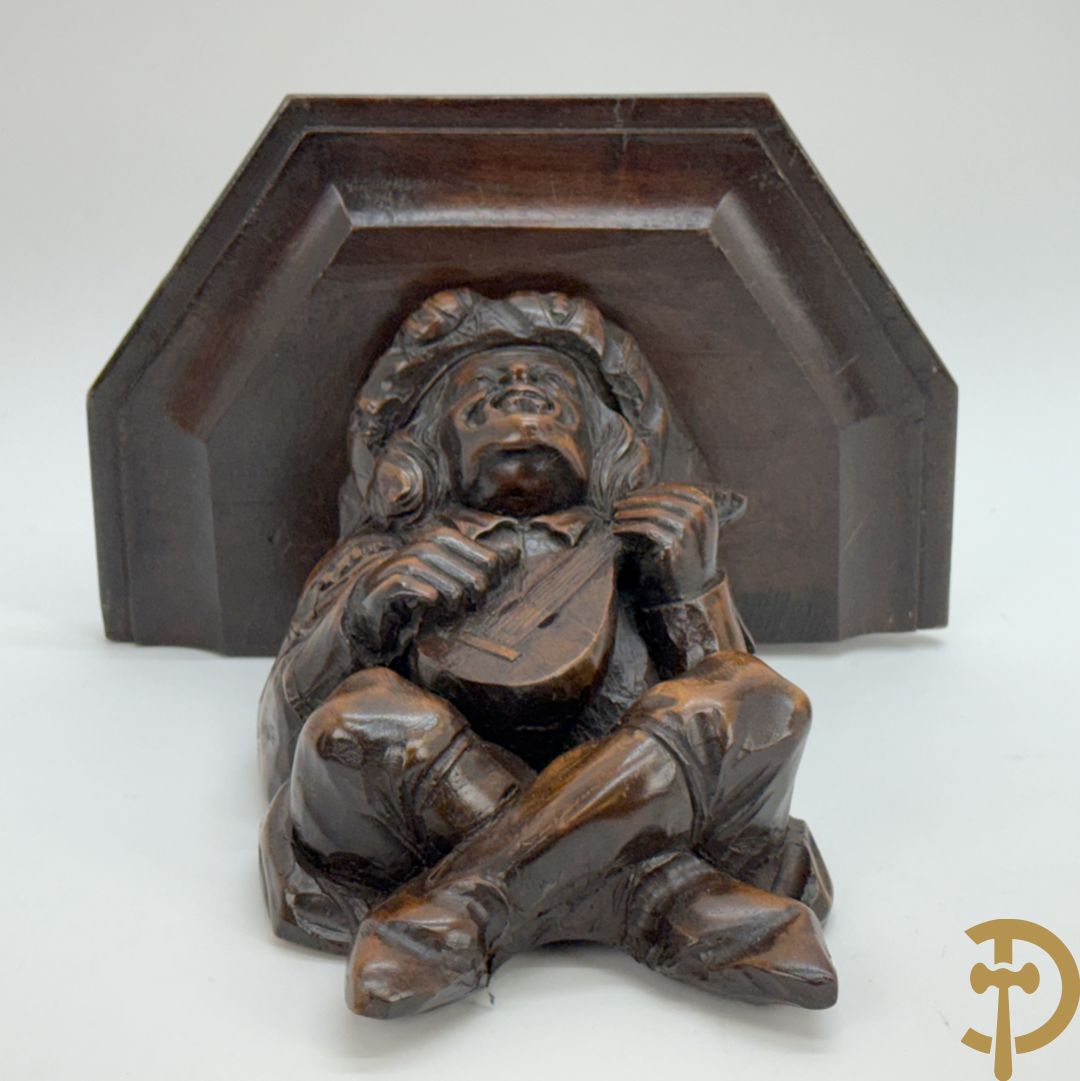 Massief eiken Engelse gesculpteerde baro- en thermometer + houtgesculpteerde console van narrenfiguur met basrelief