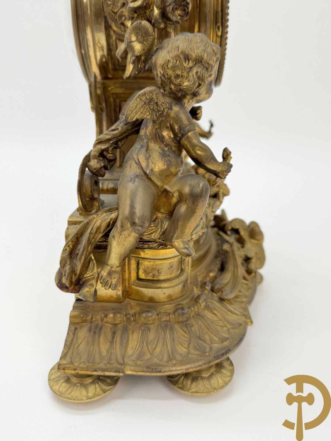 Bronzen pendule met paar cupido