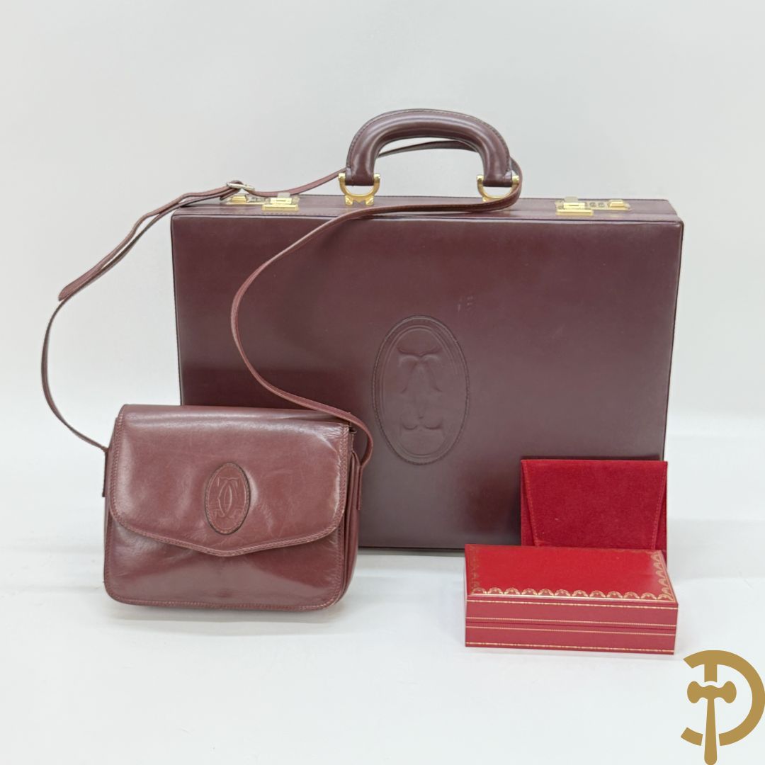 Bordeaux lederen aktentas Cartier + handtas Cartier